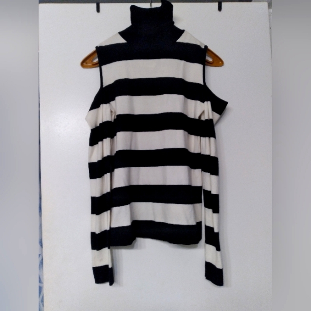 Brand new cold shoulder turtleneck